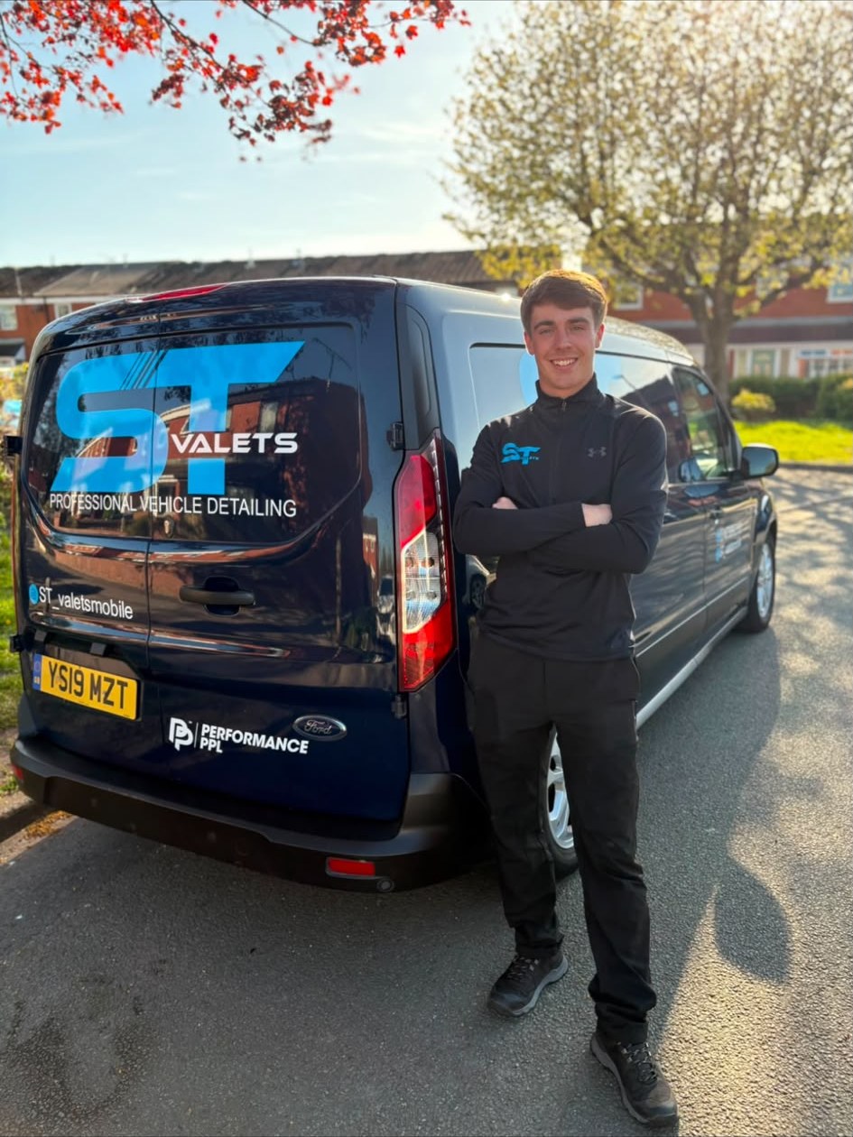 ST Valets owner standing beside the branded Ford Transit Connect valeting van